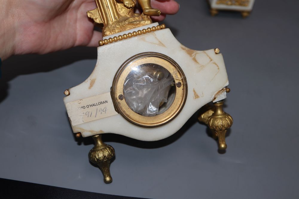 A 19th century ormolu clock garniture, with angelic surmount